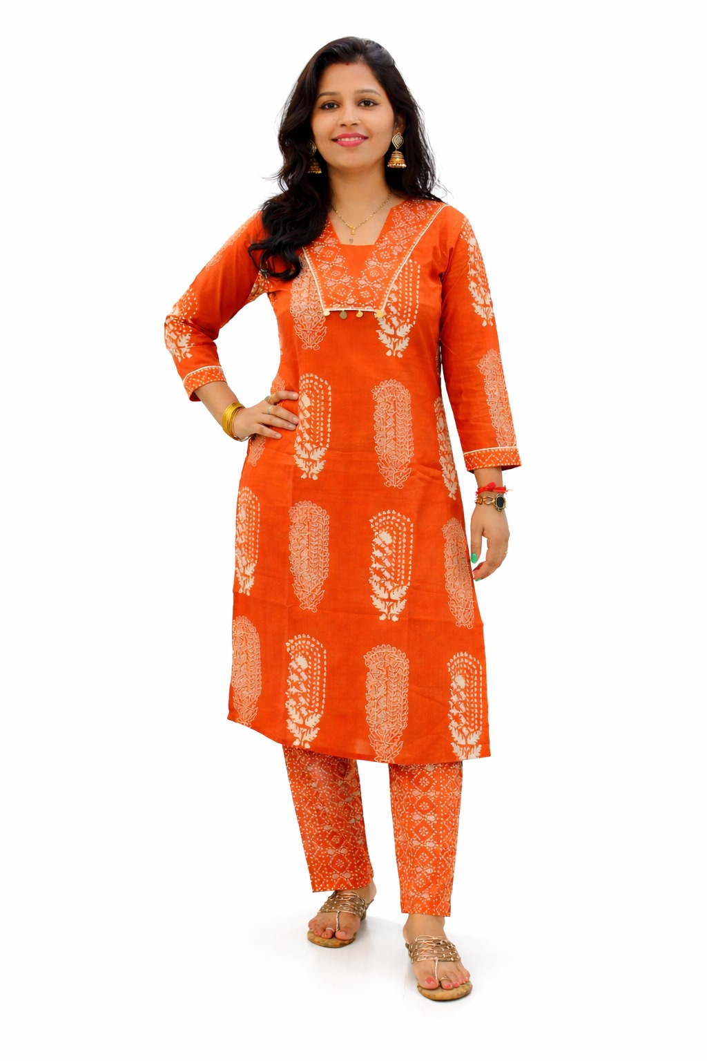 Women’s Rust orange floral motifs cotton printed kurta pant set  | v neck detalling with tussels  | 3/4 Sleeve  | comfortble regular stright fit shillouttle